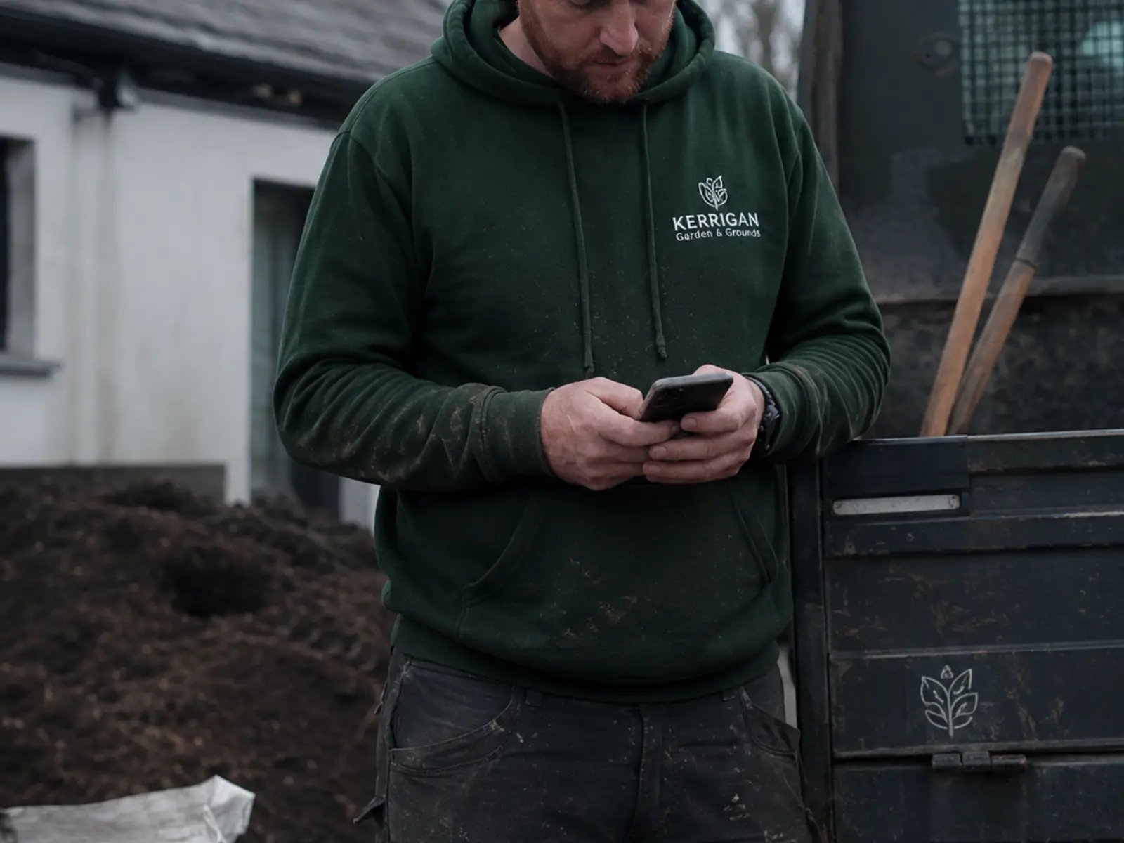 A business owner updating their website from a phone