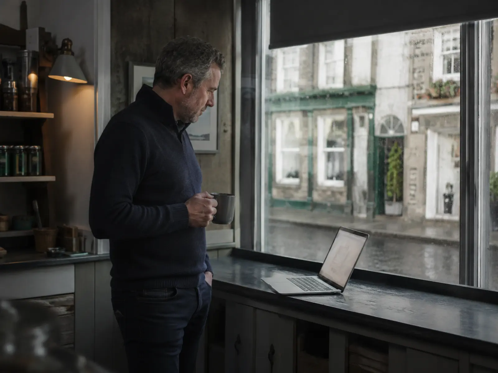 Business owner checking a custom dashboard on a laptop